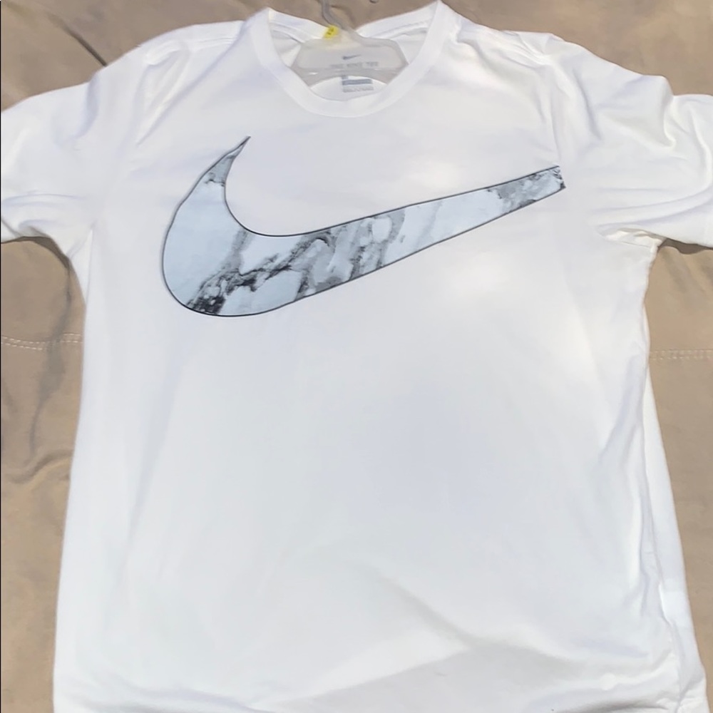 White Nike shirt